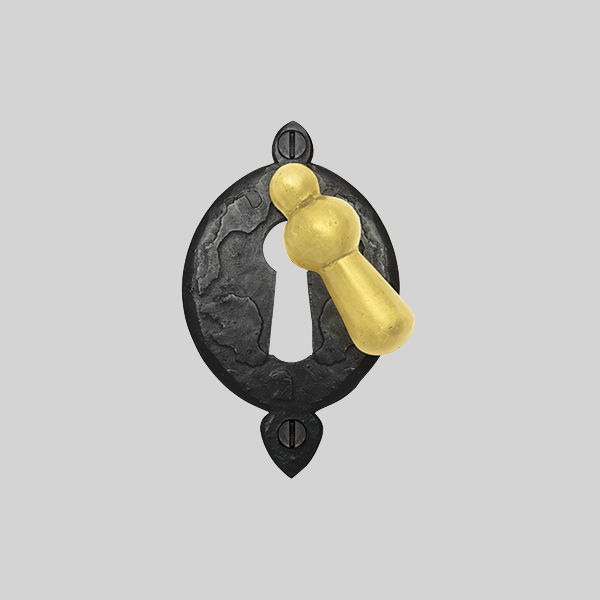 Shown with a dark wax iron and polished brass finish.