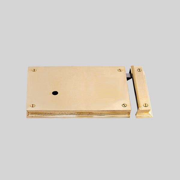 Shown as right hand with a polished brass finish.