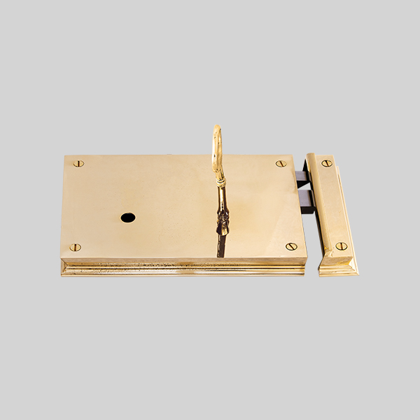 Shown as right hand with a polished brass finish.