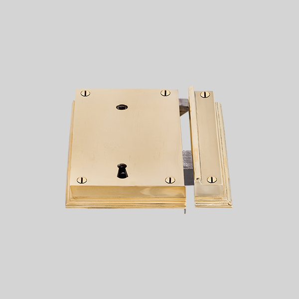 Shown as right hand with a polished brass finish.