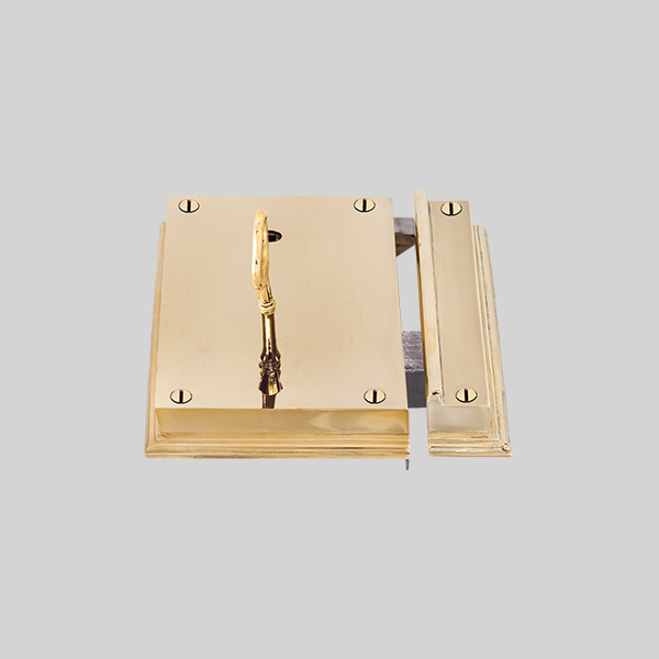 Shown as right hand with a polished brass finish.