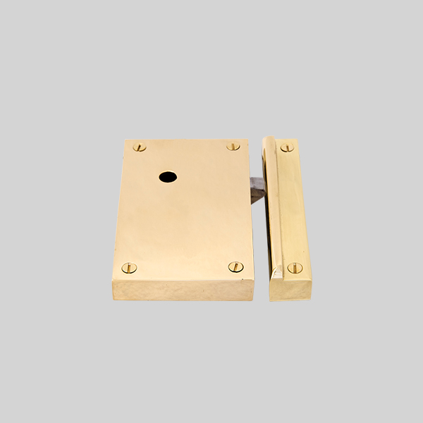 Shown as right hand with a polished brass finish.