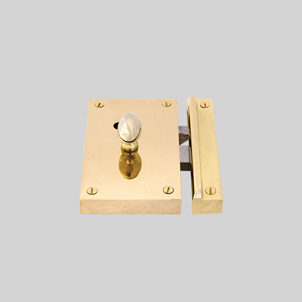 Shown as right hand with a polished brass finish.