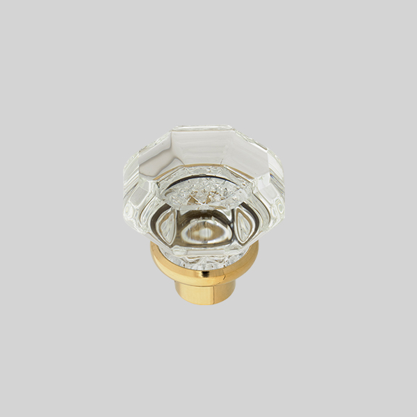 Shown in clear glass with polished brass finish.