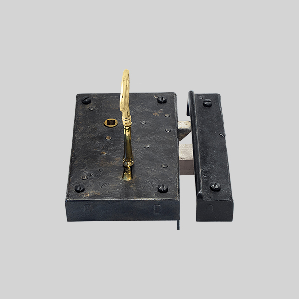 Shown as right hand with a dark wax iron finish.