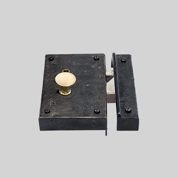 Shown as right hand with a dark wax iron finish.