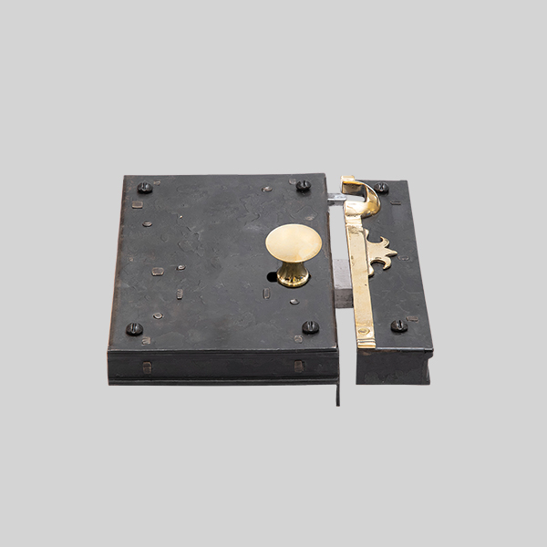 Shown as right hand with a dark wax iron finish.