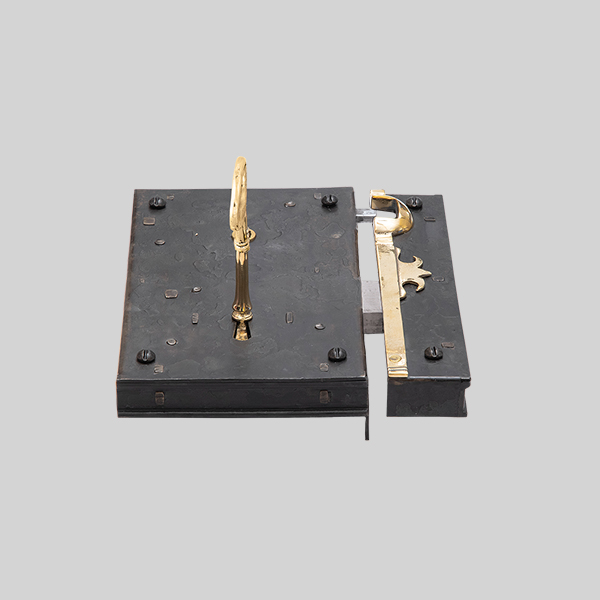 Shown as right hand with a dark wax iron finish.